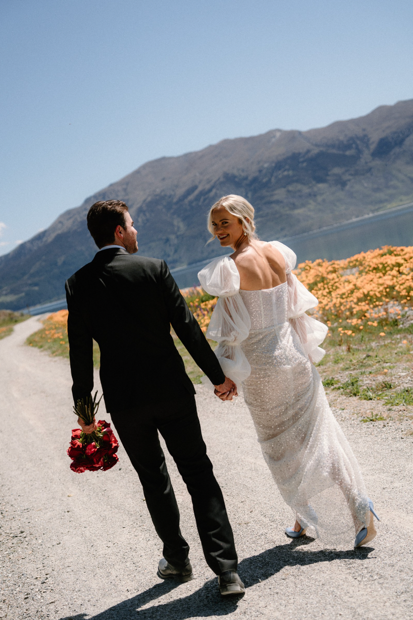 Take a risk on your wedding day with the Stella Dress! This stunning dress features a sequinned tulle column silhouette and a structured sweetheart bodice for a bold and statement-making look. Perfect for the daring bride who wants to stand out and make an unforgettable entrance.