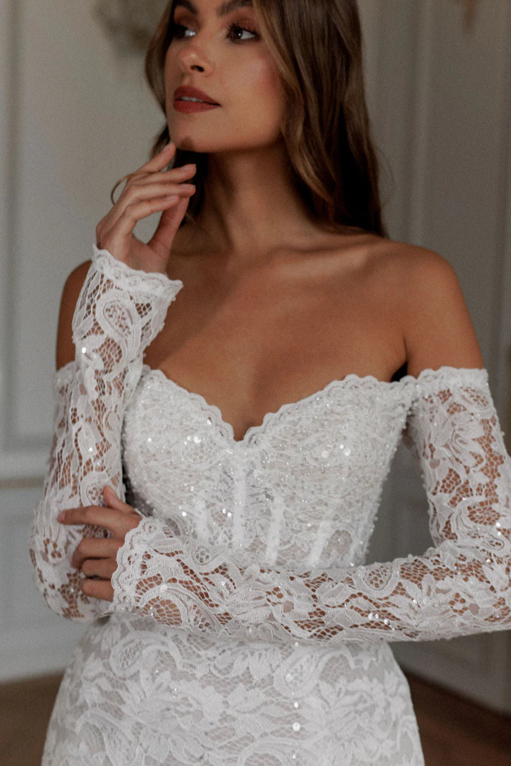 Expertly crafted with lace appliques and an elegant off shoulder design, the Robe Noemie is the perfect choice for any special occasion. The heart shaped neck adds a touch of romance to this elegant white mini dress. Make a statement and feel confident and beautiful all night long.