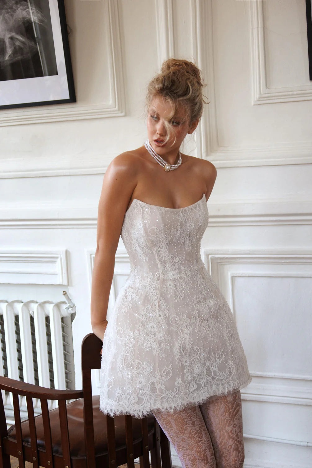 Experience the perfect combination of elegance and contemporary style with our Cameia Mini Dress. Featuring detachable sleeves and intricate lace details, this short wedding dress will make you feel like a princess. The corset back and zipper closure ensure a flawless fit, while the delicate lace adds a touch of romance.