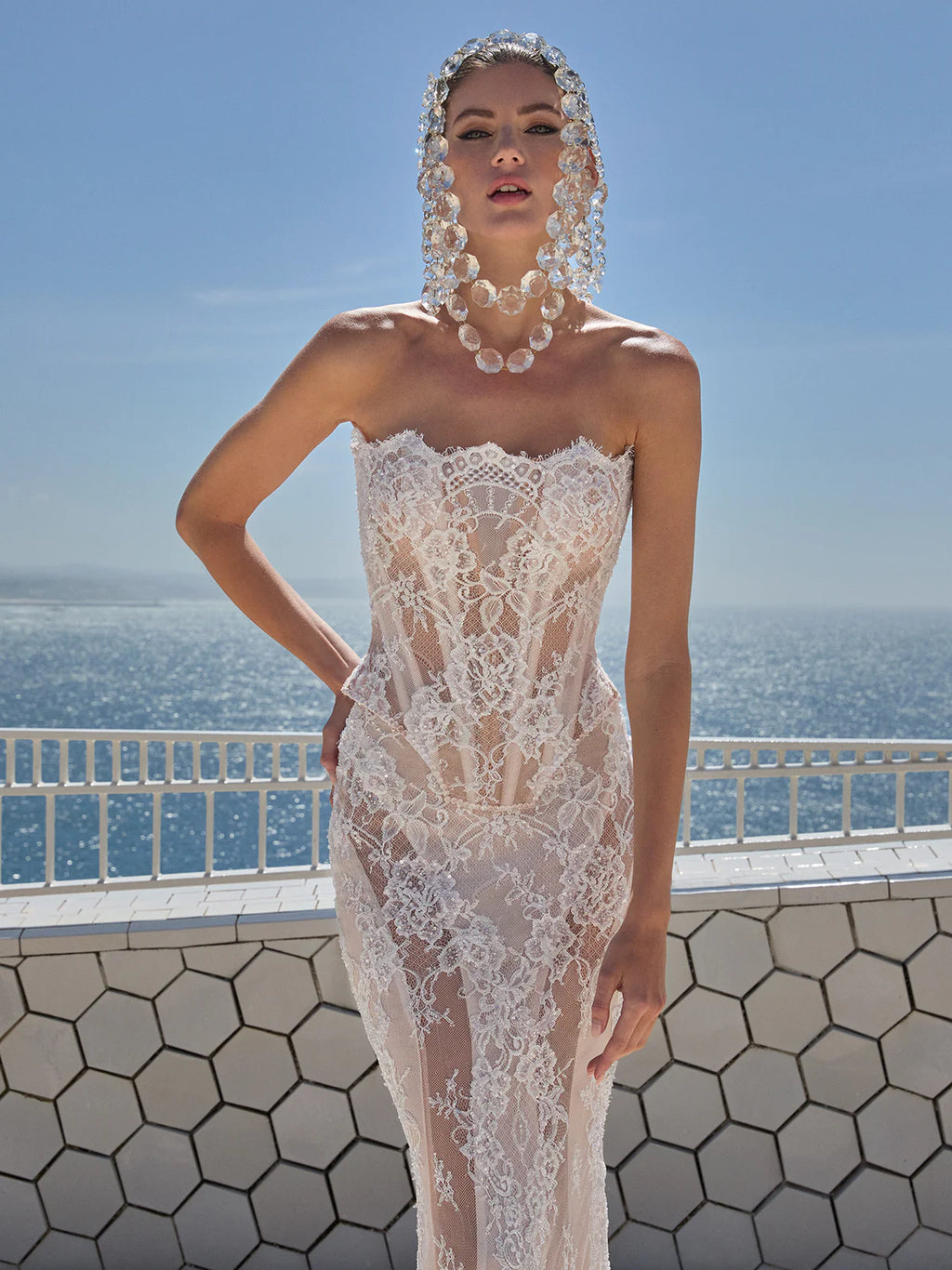 Indulge in pure luxury with the Eva Gown by Galia Lahav. This two-piece ensemble boasts a baroque-style strapless corset and an elongated mermaid skirt, both crafted from opulent embroidered French lace. The result is a striking and timeless silhouette that radiates elegance and grandeur. Elevate your style and make a statement with the Eva Gown.