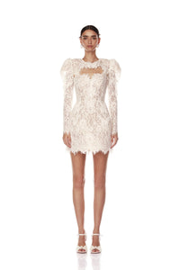 Elevate your bridal look with the Colette Lace Mini Dress. The sweetheart neckline and butterfly embellishments exude feminine grace, while the boned bodice and structured skirt provide a flattering silhouette. The hidden adjustable straps ensure a comfortable fit, making this dress perfect for your special day.