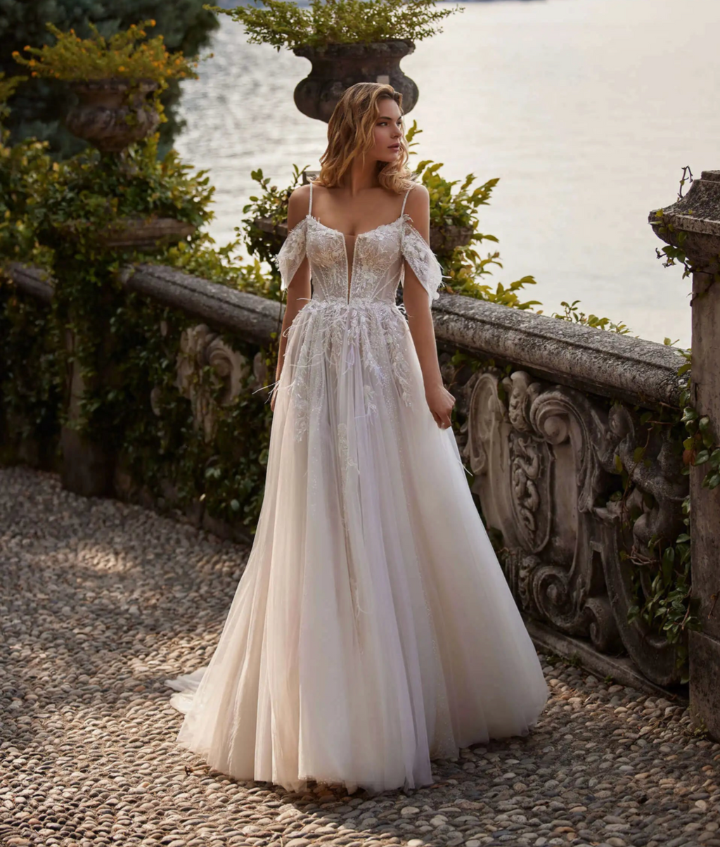 Indulge in elegance with our Robe Françoise. This stunning long dress is the perfect choice for brides and special occasions. Crafted for women, its sophisticated design will make you feel like a bride on your big day. With its luxurious fabric and impeccable silhouette, this vestidos novia will make you the center of attention.