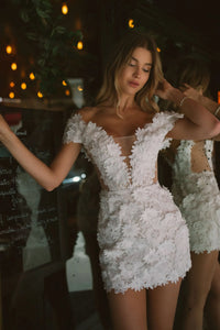 Introducing the Keia Dress, an expertly crafted choice for your next special occasion. Featuring a heart-shaped neckline and delicate floral lace appliques, this white prom dress exudes femininity and elegance. Made with high-quality fabric, it offers both style and comfort for a truly unforgettable look.