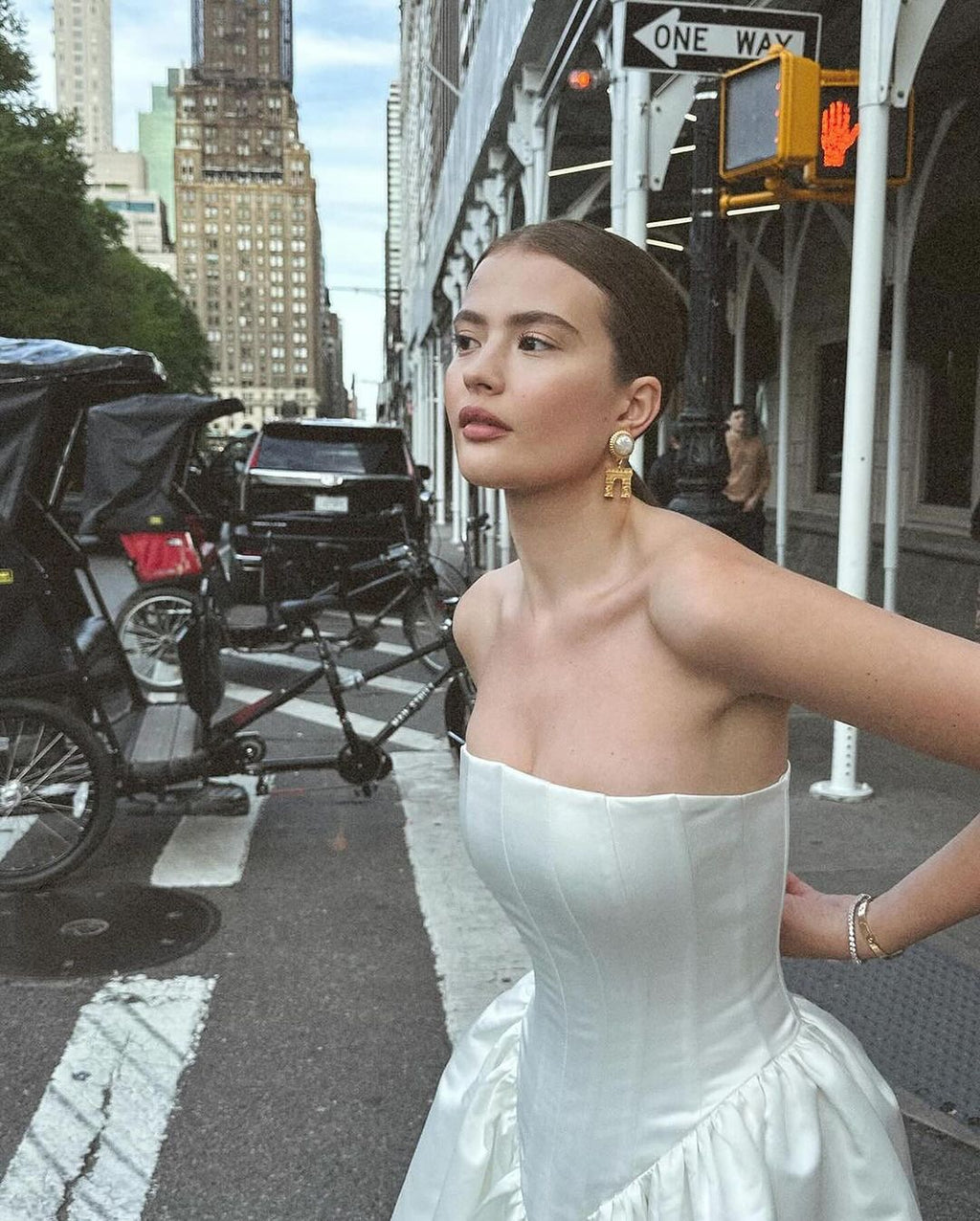 Upgrade your style with the versatile and feminine Maddison Dress. From the ceremony to the after-party, this strapless design effortlessly adapts to your desired look. Elevate your wedding attire with the perfect choice: the Eva Dress, your go-to for both beauty and functionality.
