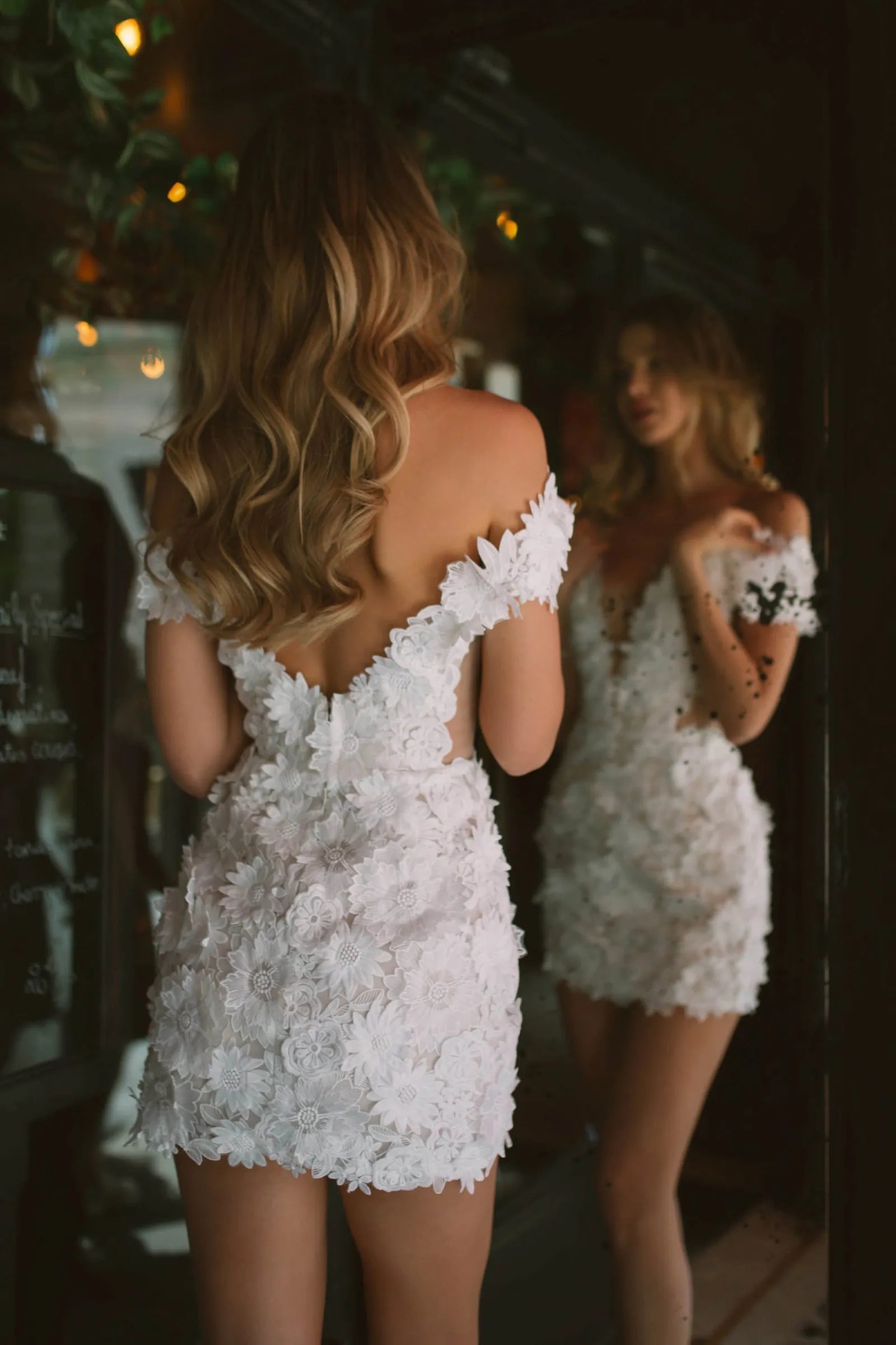 Introducing the Keia Dress, an expertly crafted choice for your next special occasion. Featuring a heart-shaped neckline and delicate floral lace appliques, this white prom dress exudes femininity and elegance. Made with high-quality fabric, it offers both style and comfort for a truly unforgettable look.