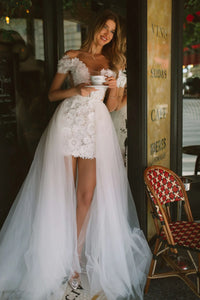 Introducing the Keia Dress, an expertly crafted choice for your next special occasion. Featuring a heart-shaped neckline and delicate floral lace appliques, this white prom dress exudes femininity and elegance. Made with high-quality fabric, it offers both style and comfort for a truly unforgettable look.