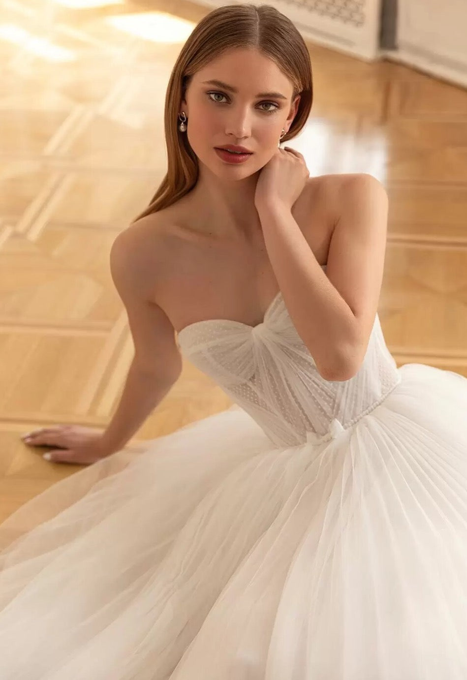 Our Dress Celine combines a sweetheart neckline and A-line silhouette for a flattering and classic bridal look. The two-piece design adds a modern twist, providing versatility for different wedding styles. Perfect for brides who want a timeless yet unique wedding dress.