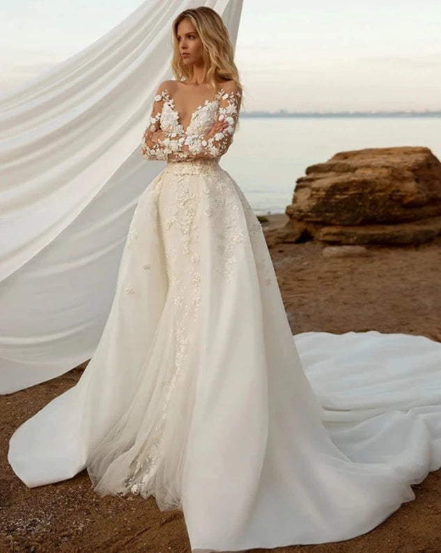 Look remarkable at your wedding in this gorgeous Robe Mireilla. It features a mermaid silhouette, backless design, detachable train, V-neck and tulle fabric for a unique, elegant look. Enjoy your special day in the perfect dress that is sure to make an unforgettable statement.