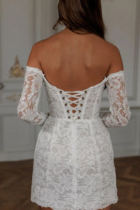 Expertly crafted with lace appliques and an elegant off shoulder design, the Robe Noemie is the perfect choice for any special occasion. The heart shaped neck adds a touch of romance to this elegant white mini dress. Make a statement and feel confident and beautiful all night long.