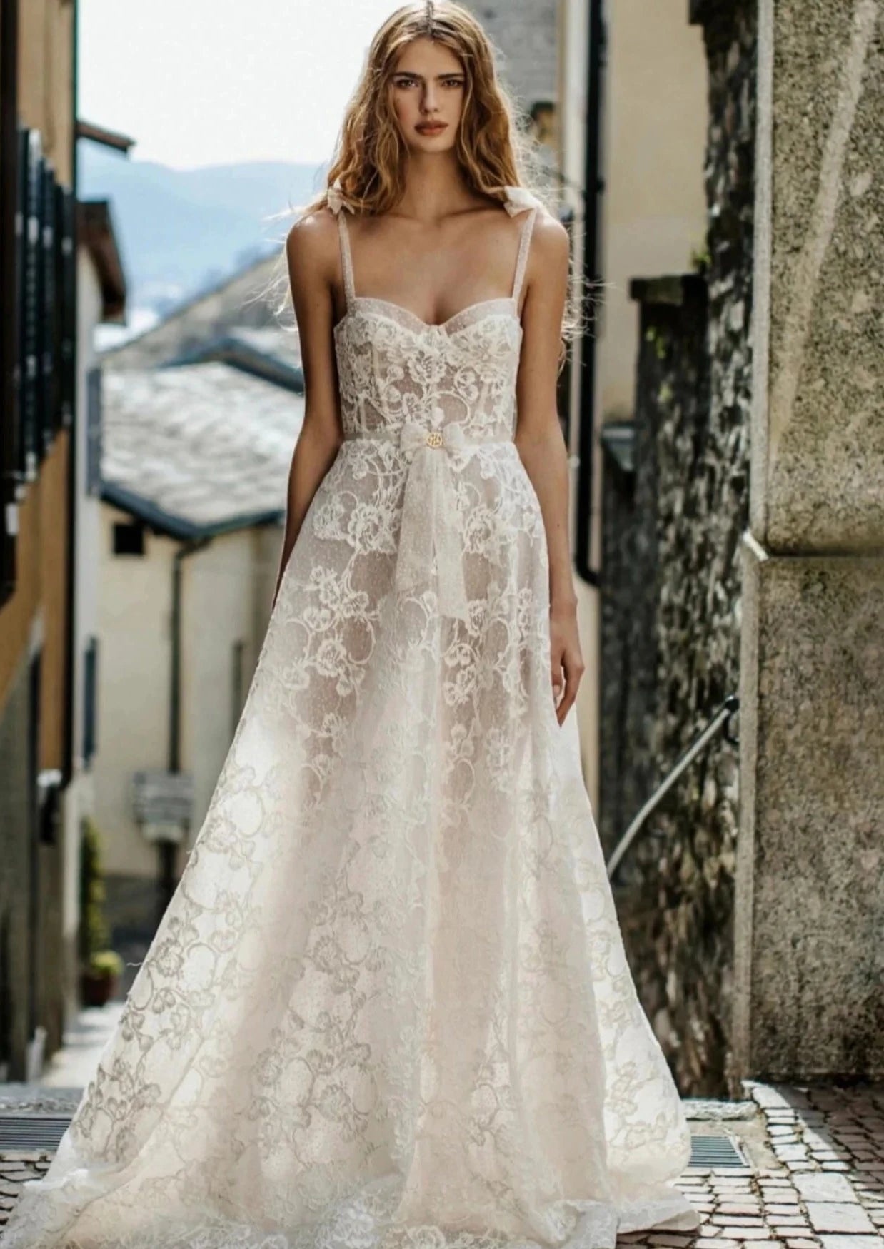 Indulge in luxury with our Robe Liliane. This stunning lace wedding dress features an A-line silhouette and modern design, creating an elegant and timeless look. With its long length and intricate lace detailing, this dress is perfect for the modern bride looking for a touch of sophistication. Elevate your wedding day with our exclusive Robe Liliane.