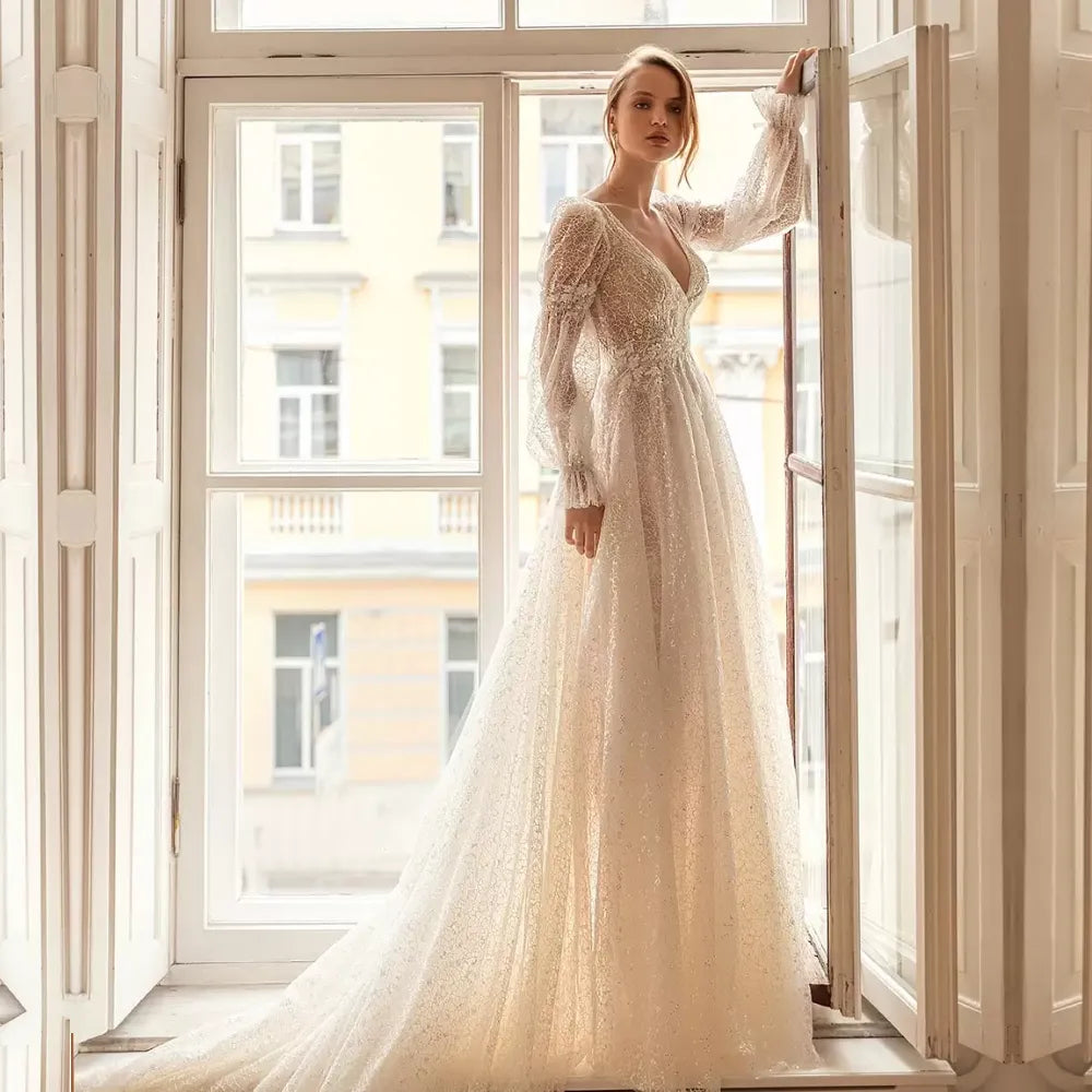 The Romilly Robe is the perfect bridal gown for your special day. Featuring a v-neckline, full long sleeves, and an A-line silhouette, this bespoke dress will make an elegant statement. Plus, the fabric is tailored to fit you just right for unparalleled comfort. Create lasting memories in the Robe Romilly!