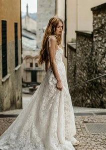 Indulge in luxury with our Robe Liliane. This stunning lace wedding dress features an A-line silhouette and modern design, creating an elegant and timeless look. With its long length and intricate lace detailing, this dress is perfect for the modern bride looking for a touch of sophistication. Elevate your wedding day with our exclusive Robe Liliane.