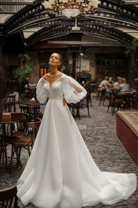  classic white bridal gown with beautiful long sleeves