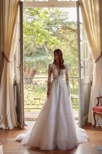 Indulge in pure elegance with our Mirae Gown. This chic A-line gown is designed to sparkle and captivate, making it the perfect choice for any bridal occasion. Its romantic silhouette will make you feel like a true princess on your special day. Upgrade your bridal look with this stunning dress.